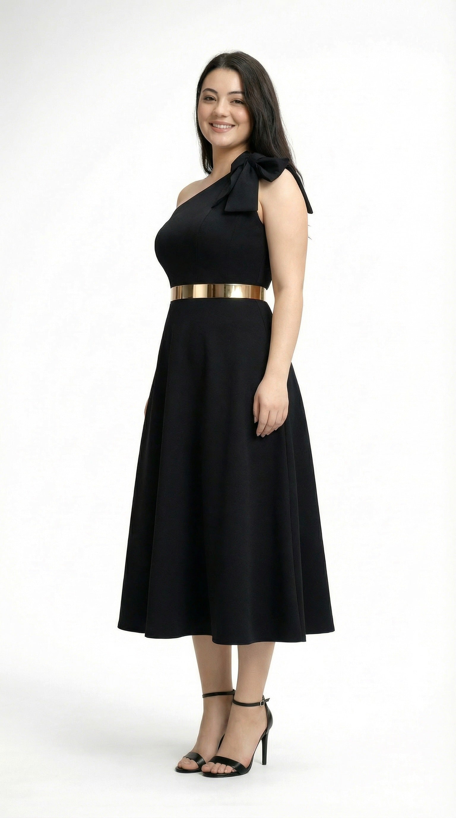 lou model wearing a black dress with a gold belt from Meleche or Meléche (short as (Mé))