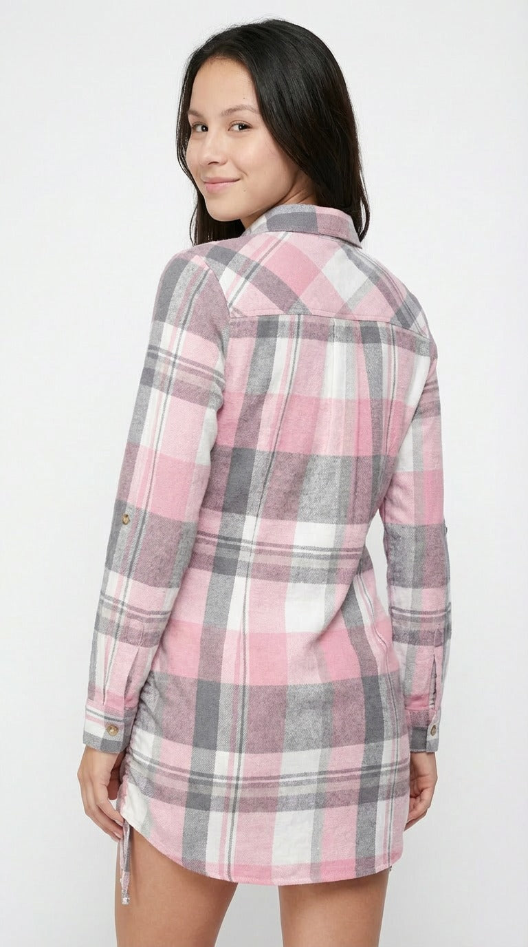 Woman wearing a pink and gray plaid dress against a white background from Meleche or Meléche (short as (Mé))
