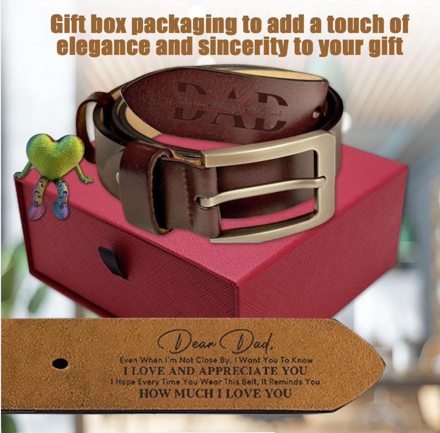 Gael belt Brown leather belt with gold buckle on a pink box, accompanied by a heart-shaped object and a personalized card from Meleche or Meléche (short as (Mé))