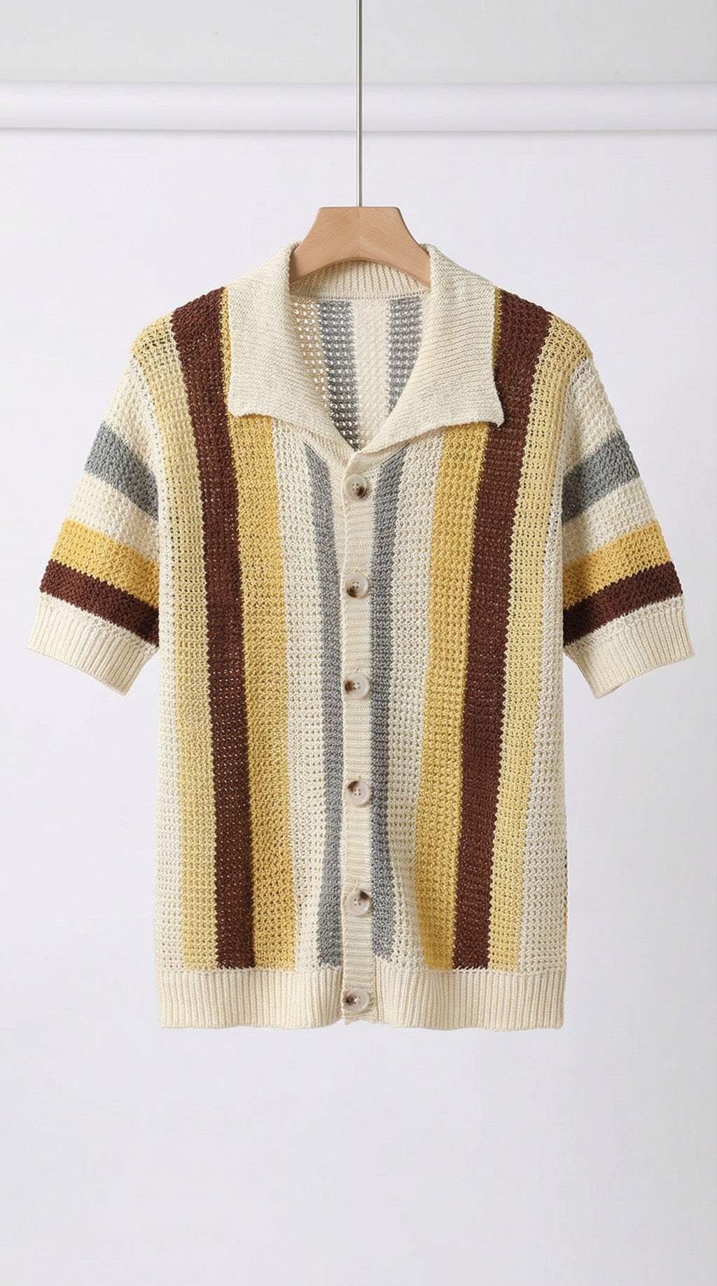 Striped short-sleeve cardigan on a hanger against a white background