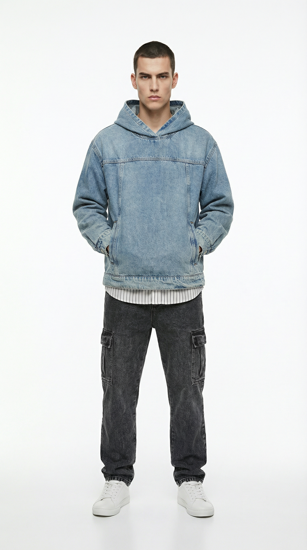 Man wearing a blue denim hoodie and David black cargo Jeans from Meleche or Meléche (short as (Mé))