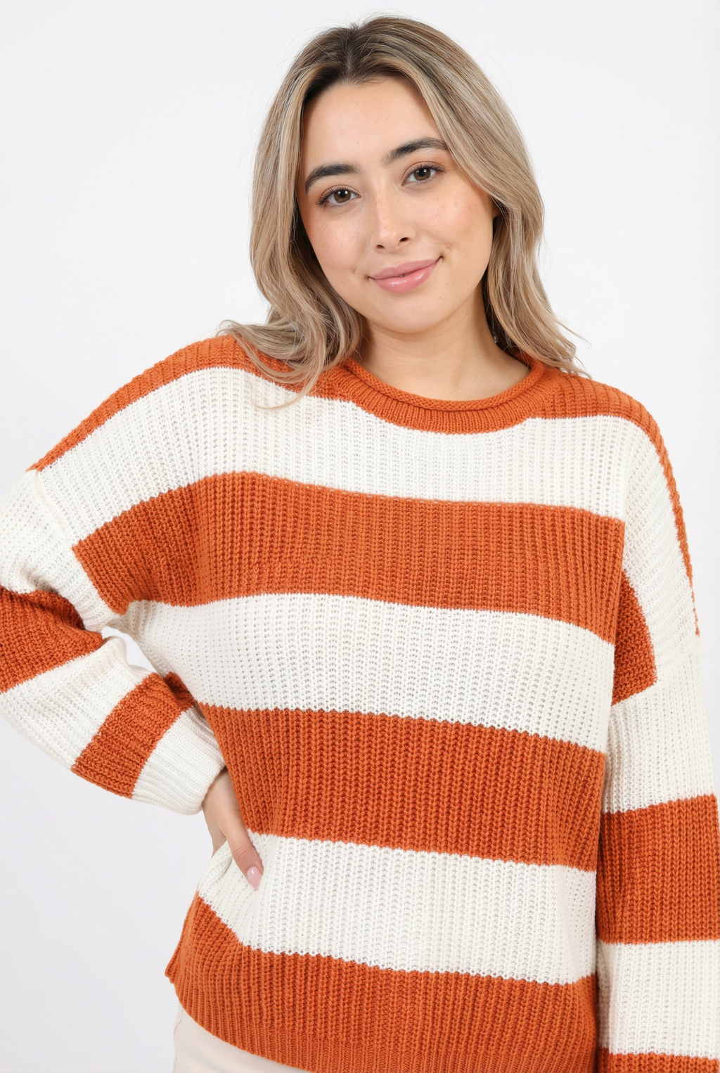 chloe surreal wearing a striped orange and white sweater from Meleche or Meléche (short as (Mé)) on a plain background