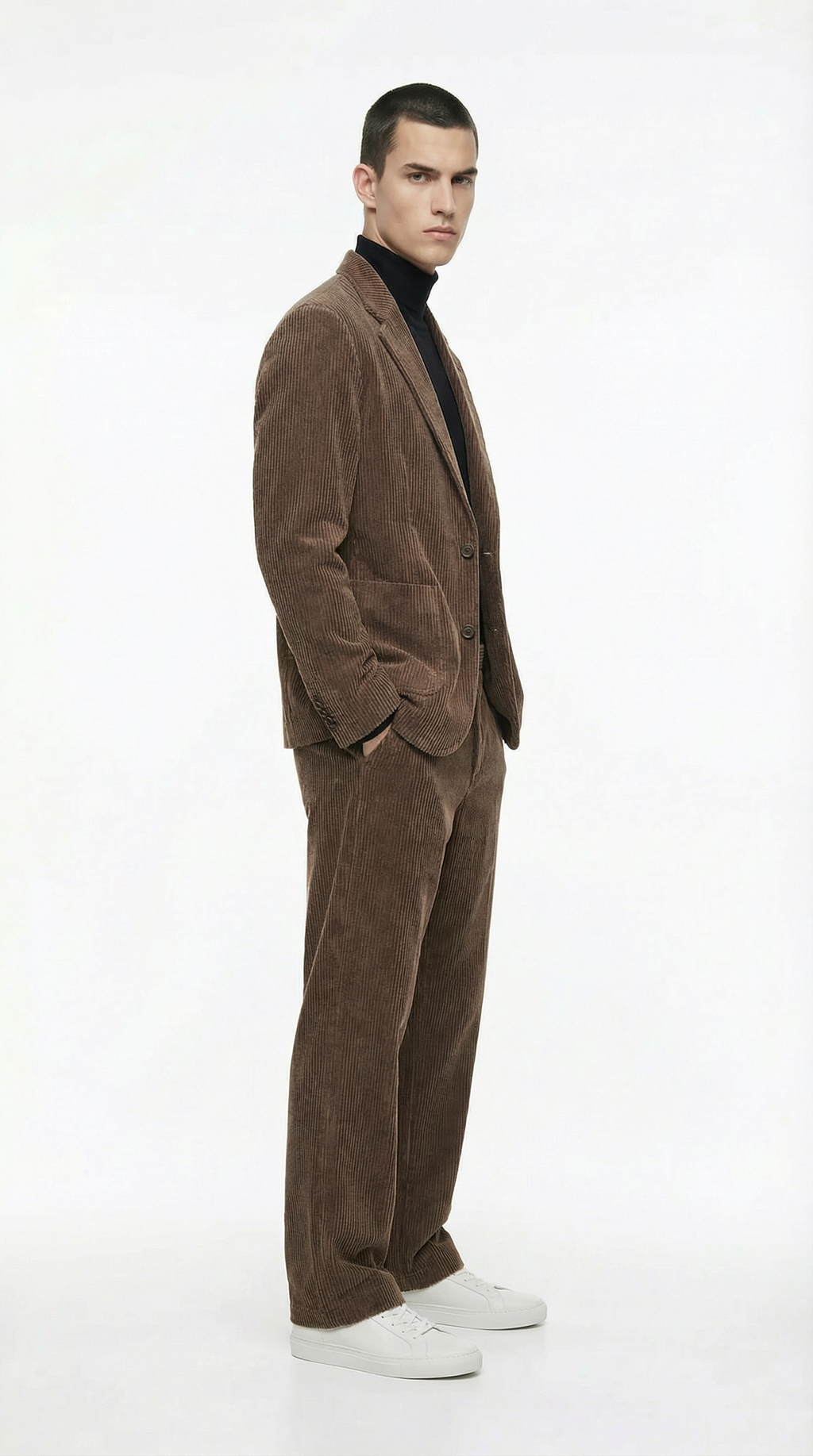 Man wearing a brown corduroy suit from Meleche or Meléche (short as (Mé))