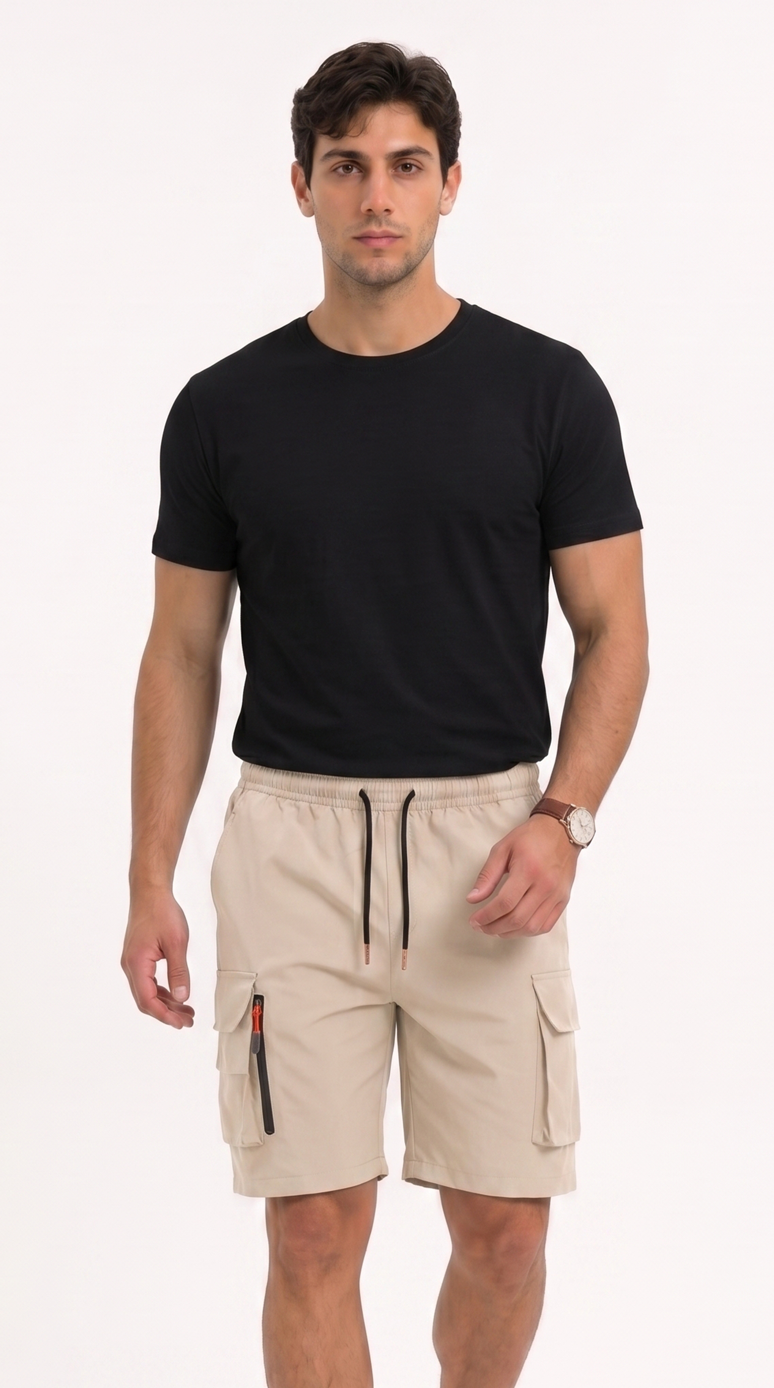 A man modeling a black short-sleeve crewneck t-shirt and beige cargo shorts with black drawstrings, standing against a plain white studio background, from Meleche Fashion USA or Meléche (short as (Mé))