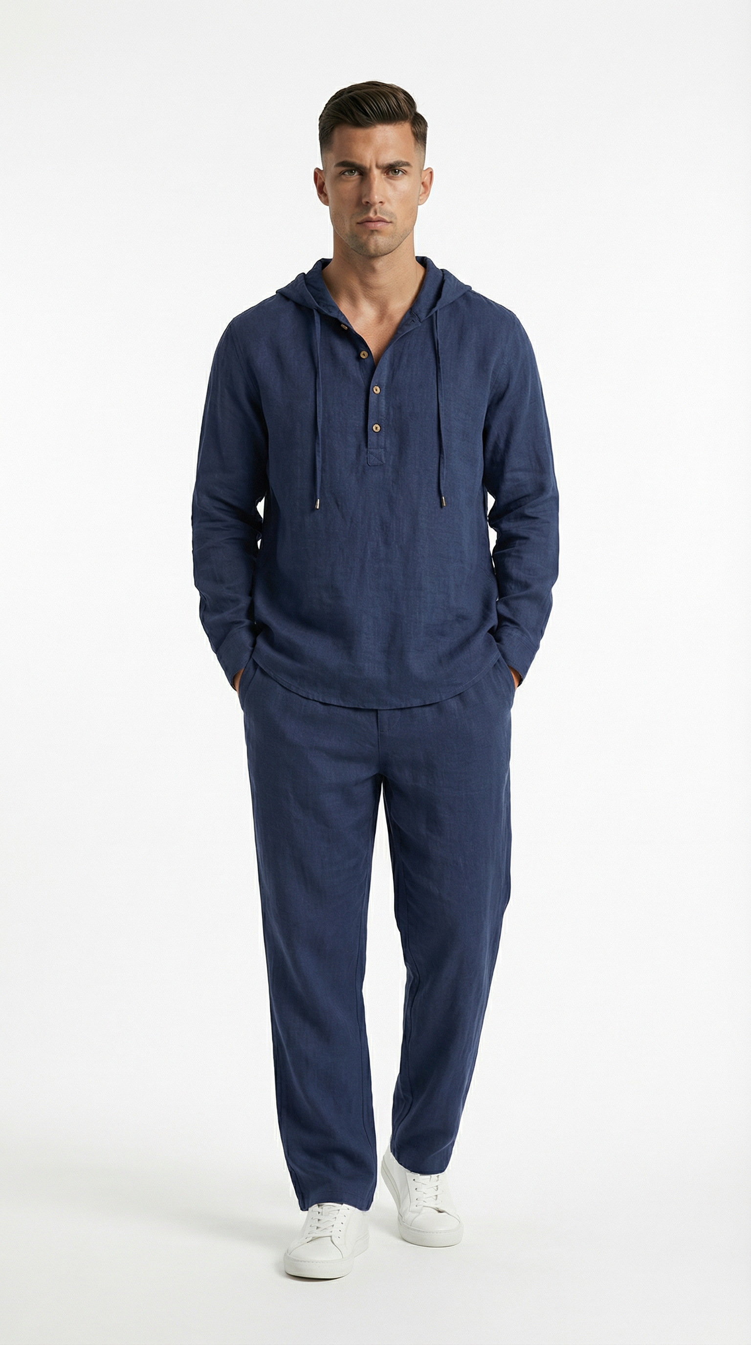 Man wearing a navy blue tracksuit with white shoes from Meleche or Meléche (short as (Mé))