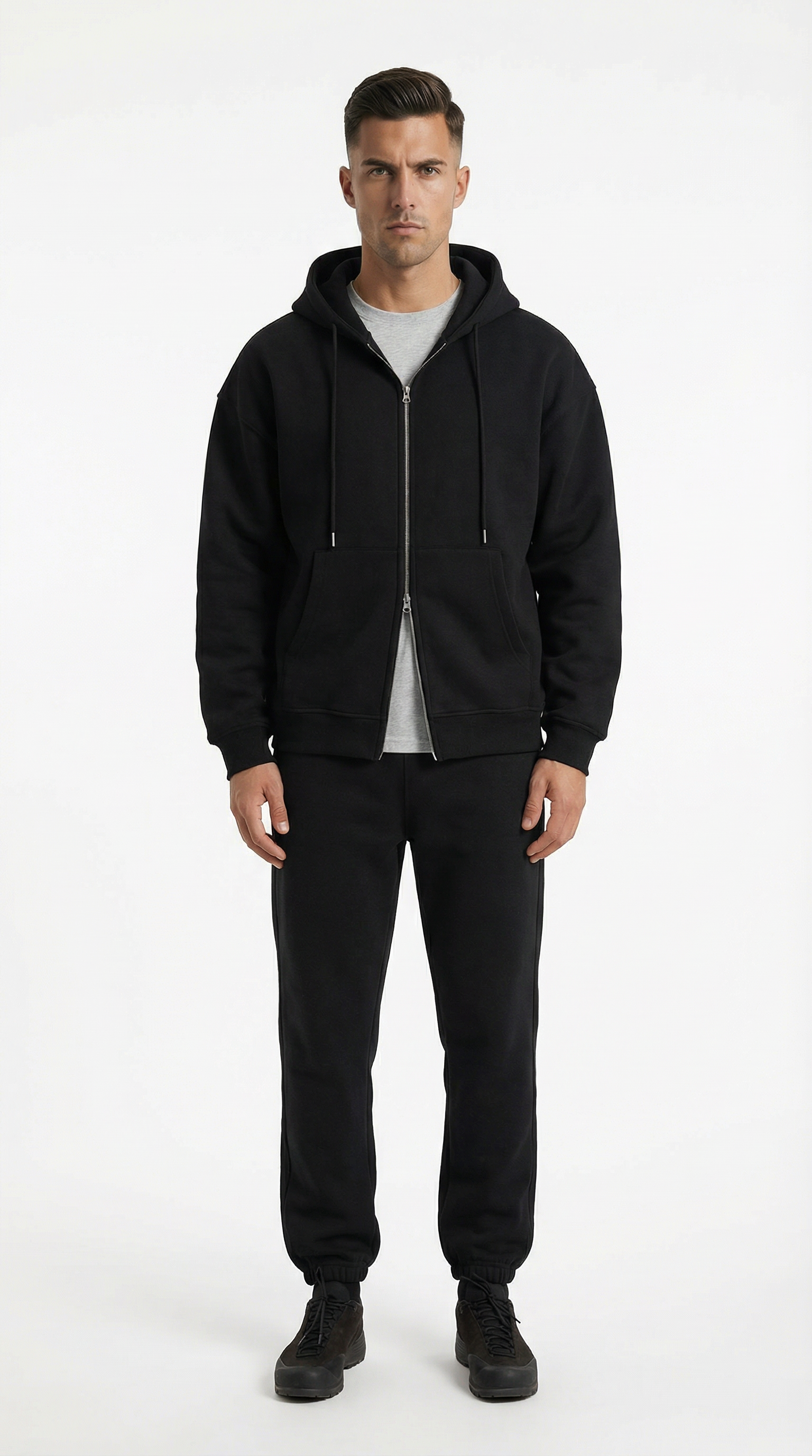 Man wearing a white outfit on a white background