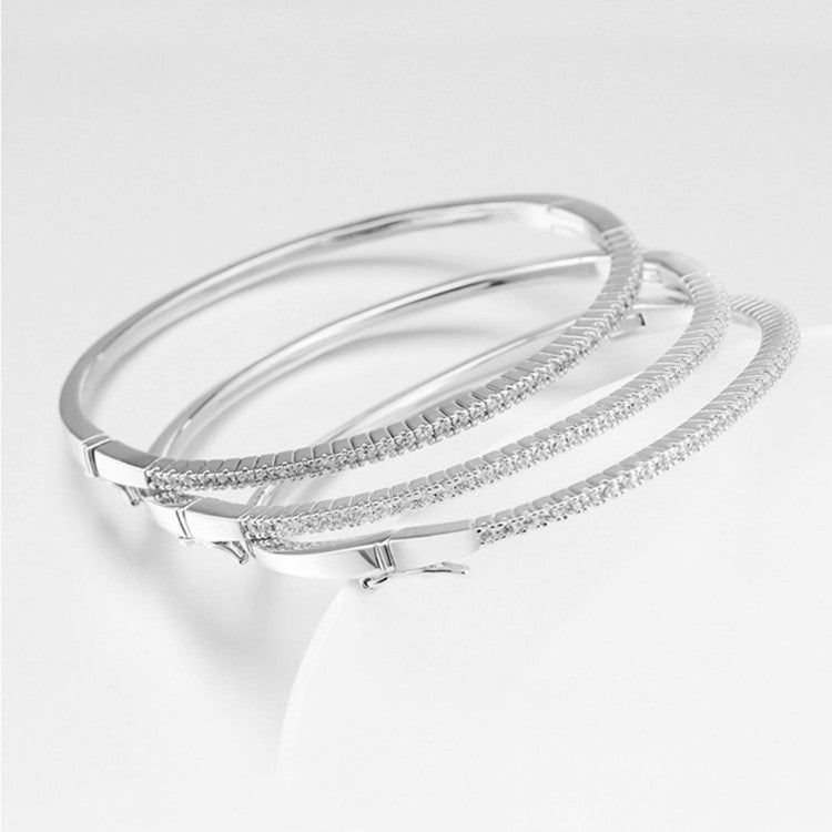 Sleek Misty Bangle in a modern design, perfect for layering Meléche Jewelry USA  