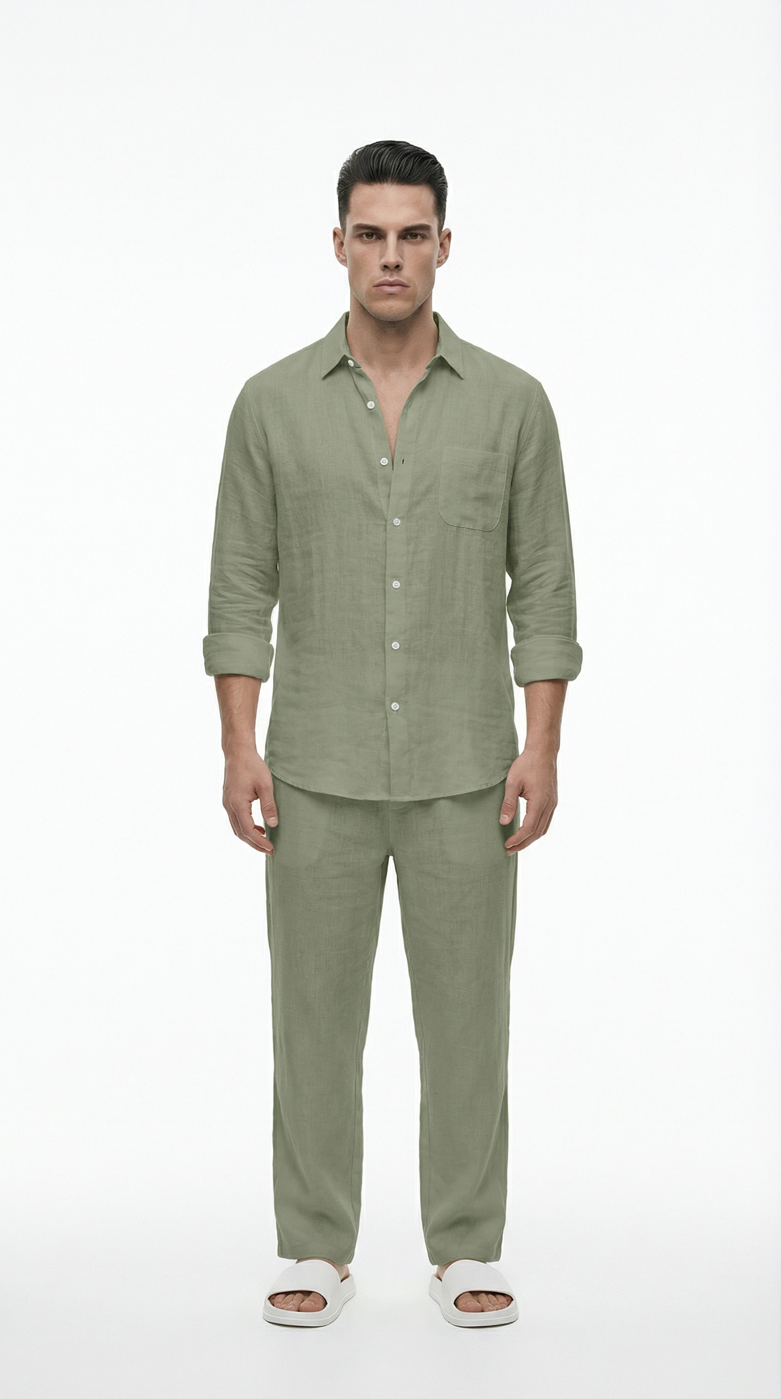 Man wearing a green linen shirt and pants on a white background