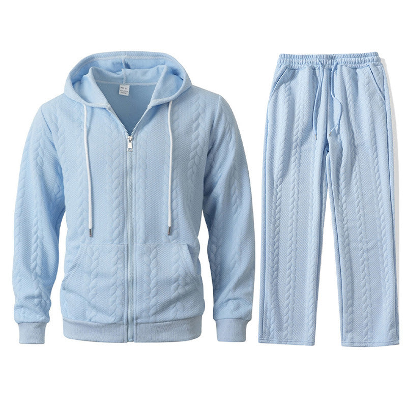Light blue quilted jacket and pants set on a white background