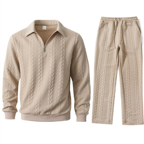 Beige cable-knit sweater and pants set on a white background
