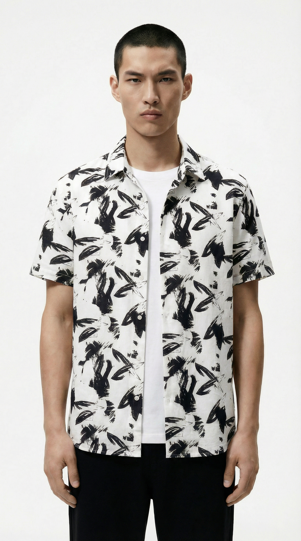 Man wearing a beige shirt over a white shirt from Meleche or Meléche (short as (Mé))