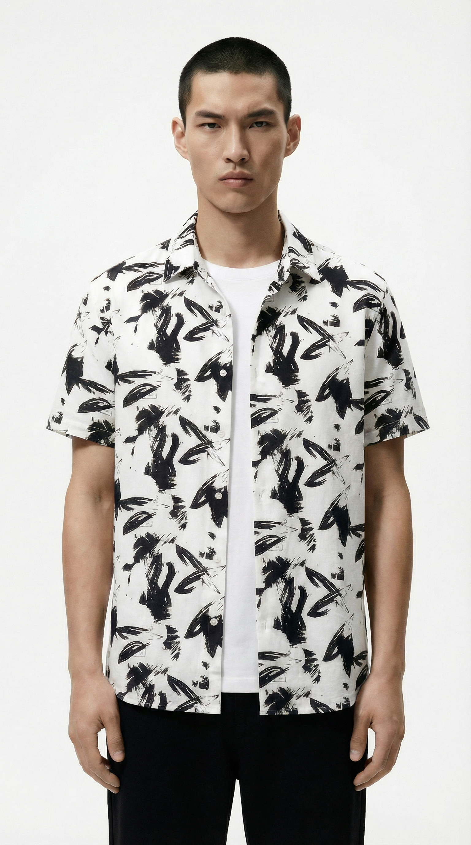 Man wearing a beige shirt over a white shirt from Meleche or Meléche (short as (Mé))