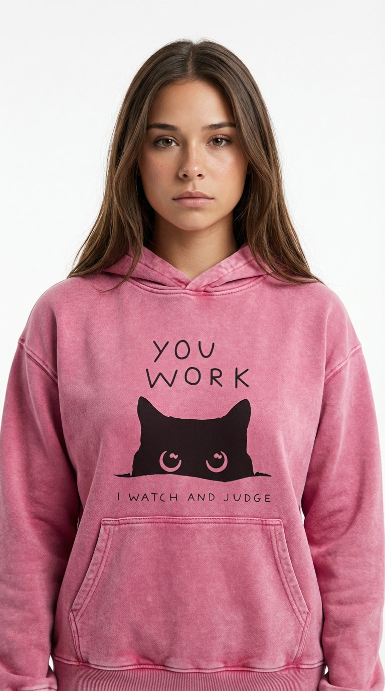 Sophie Rain in Pink hoodie with a black cat graphic and text from Meleche or Meléche (short as (Mé))