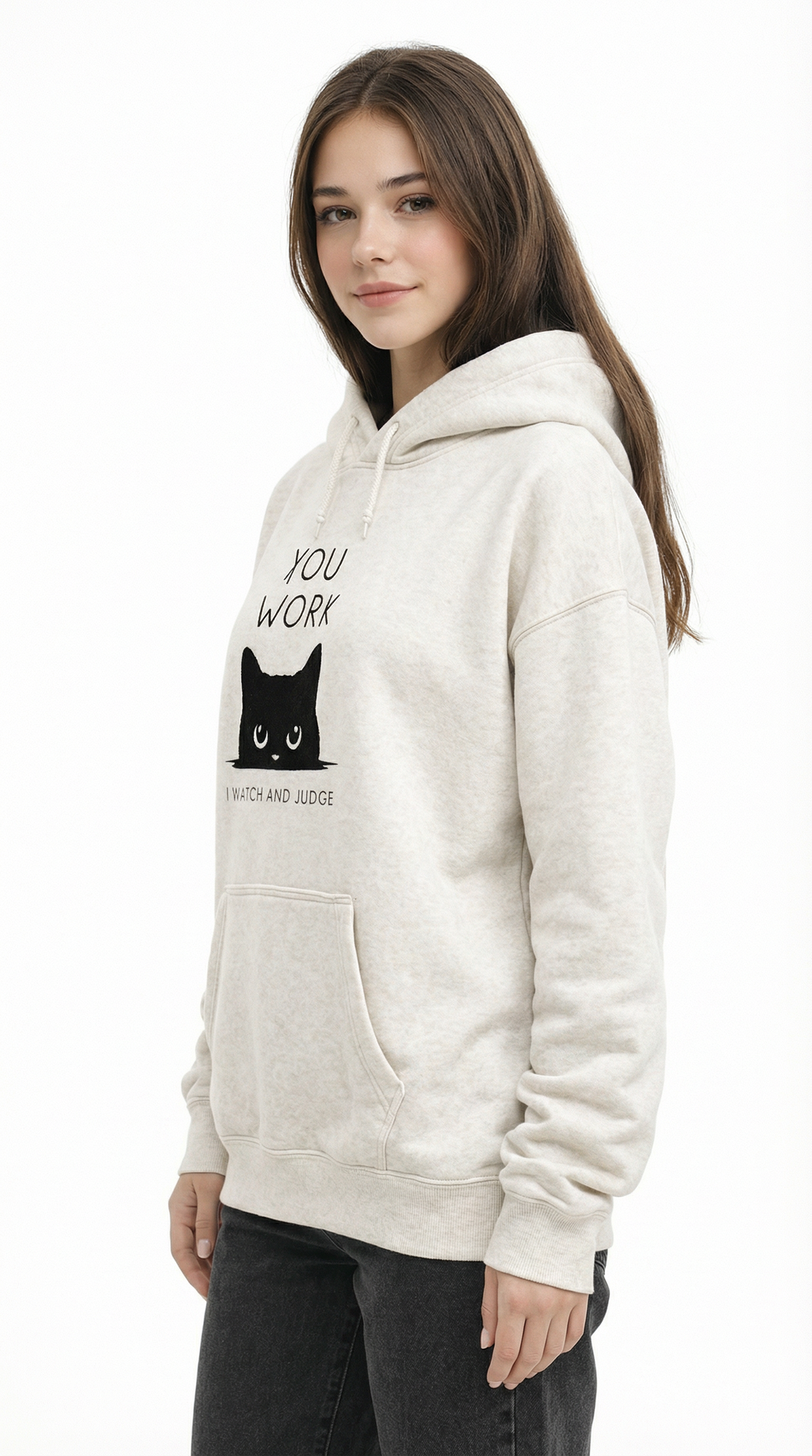Woman wearing a beige hoodie with a graphic design on a white background