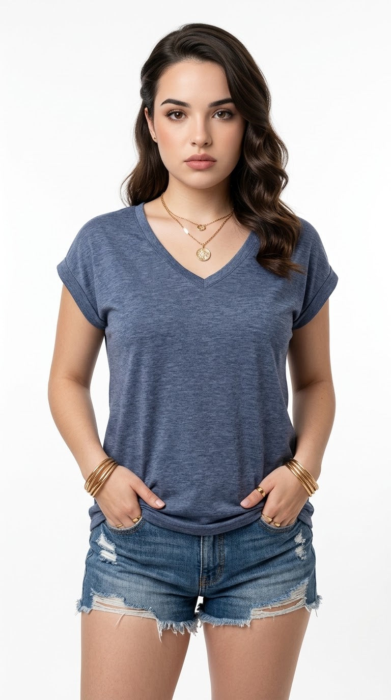 A woman modeling a heathered slate blue v-neck t-shirt with short sleeves, paired with distressed denim shorts, against a plain white studio background, from Meleche Fashion USA or Meléche (short as (Mé))