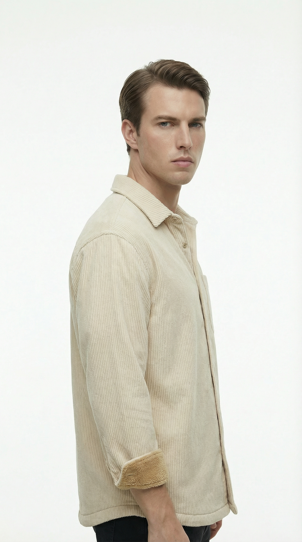 Man wearing a beige shirt with a white background