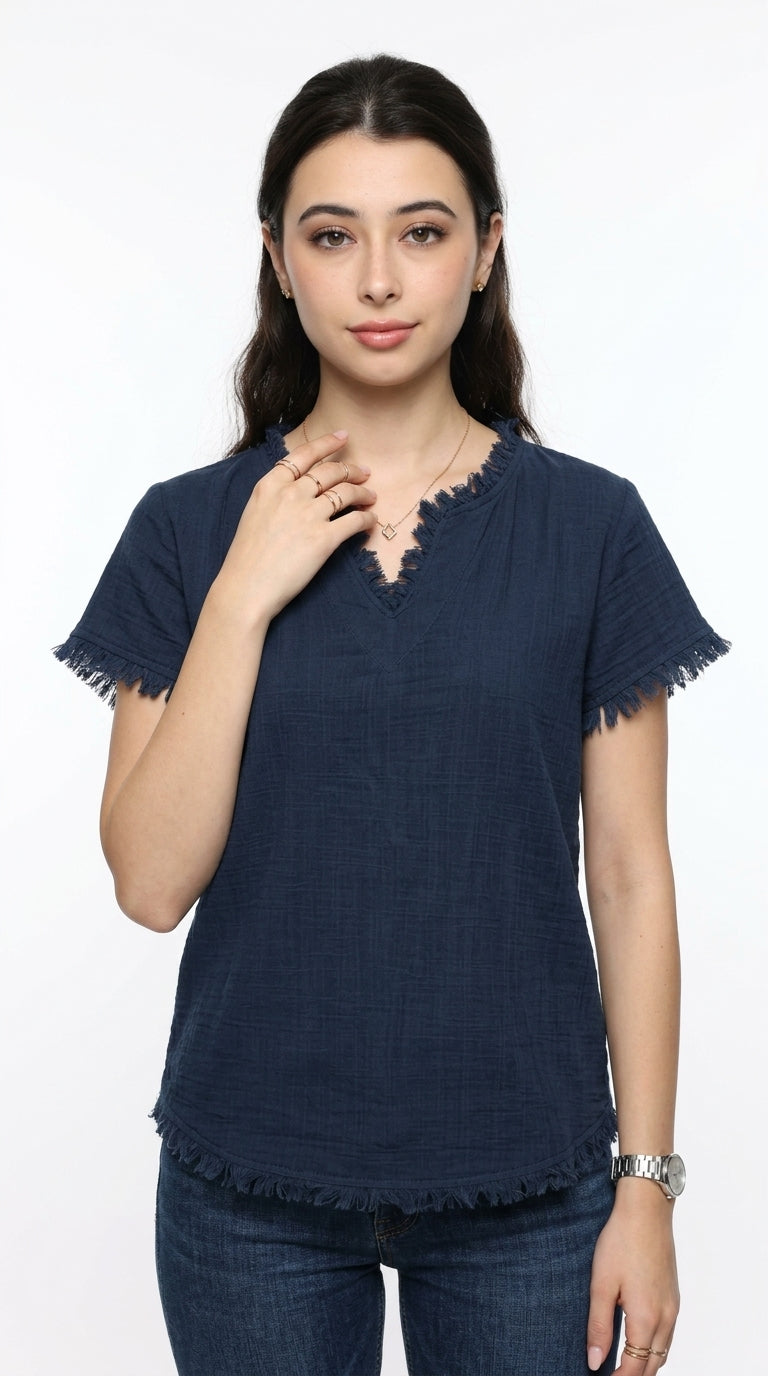 A woman modeling a dark navy blue short-sleeve top with a frayed V-neckline and frayed sleeve edges, paired with dark blue jeans, against a plain white background, from Meleche Fashion USA or Meléche (short as (Mé))