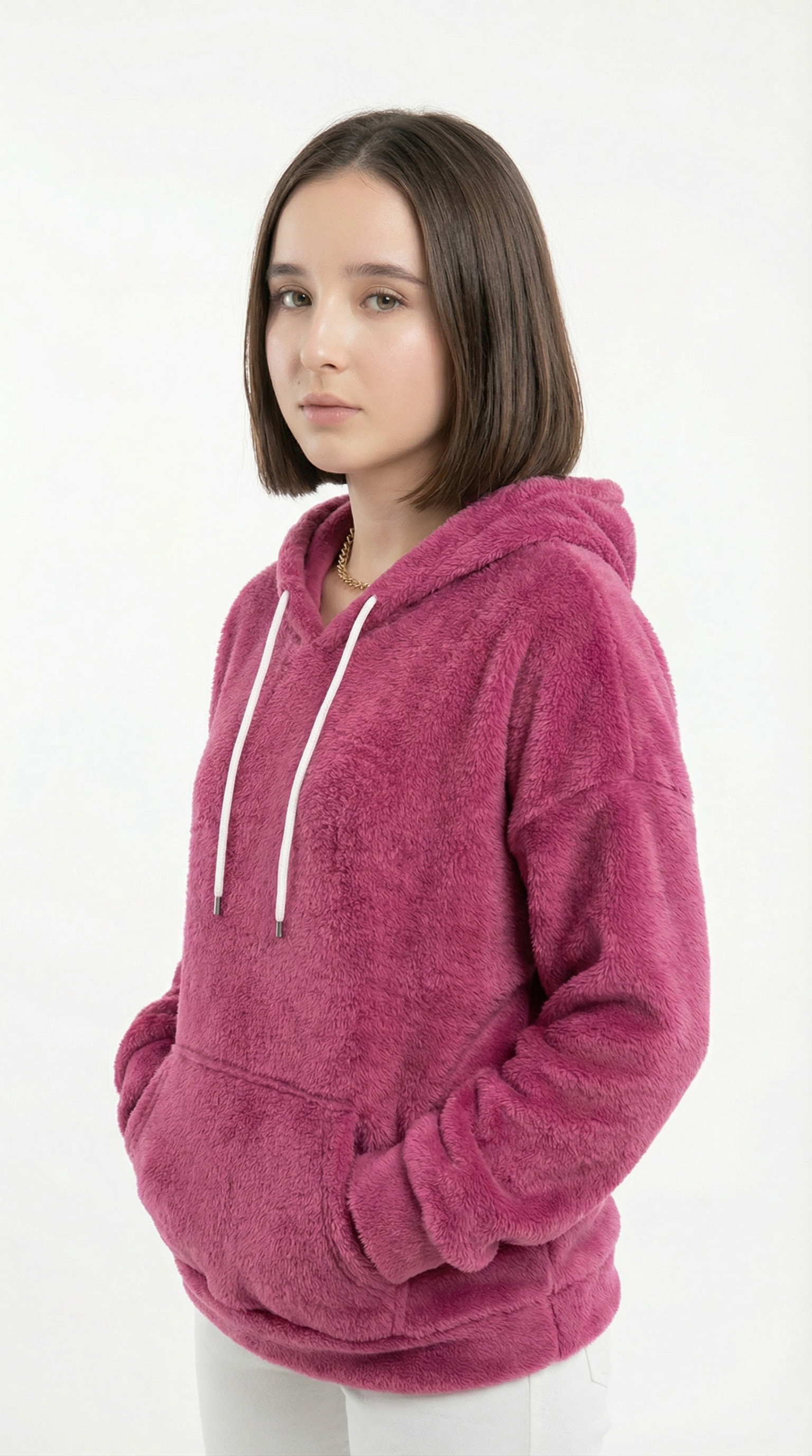 Person wearing a pink hoodie on a white background