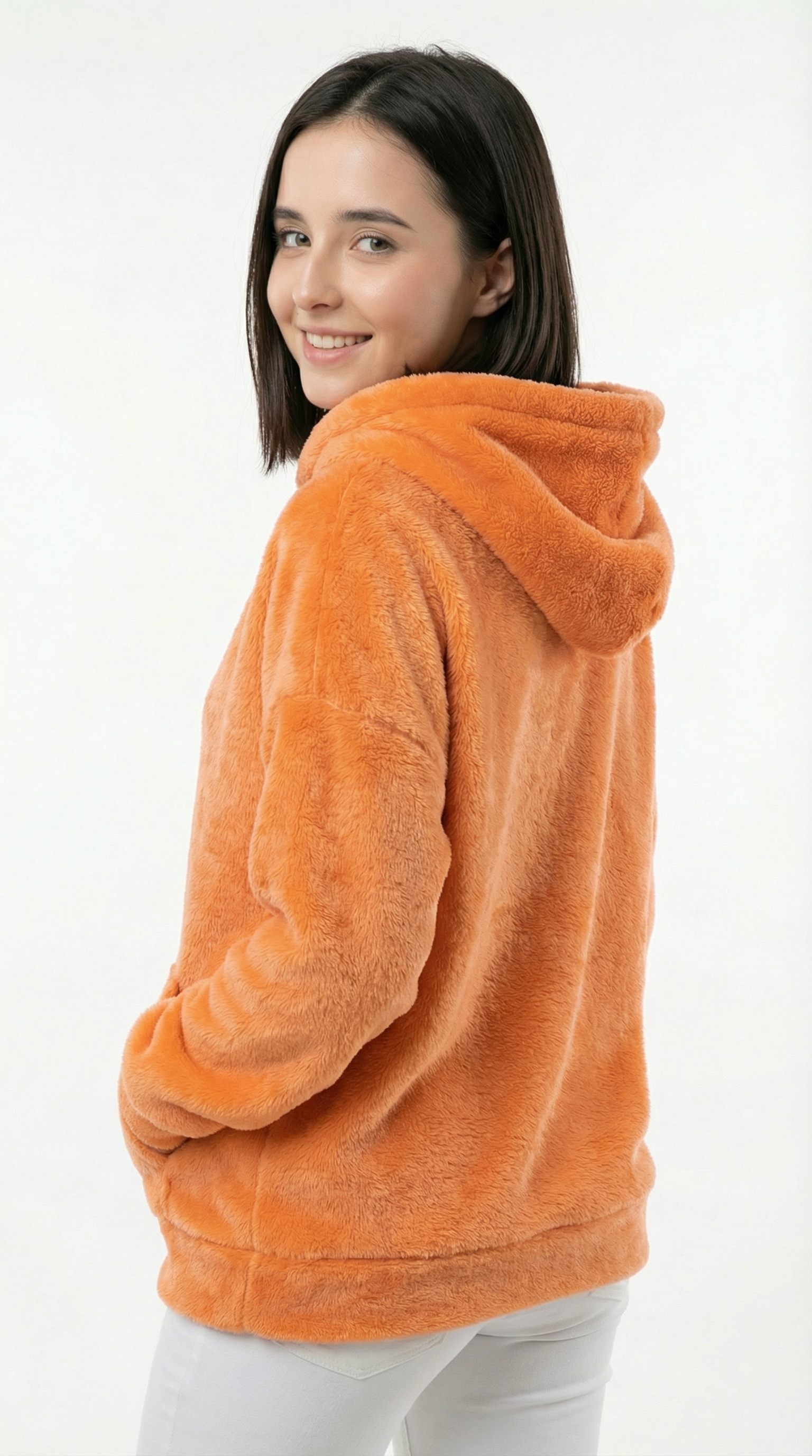 Woman wearing an orange hoodie on a white background