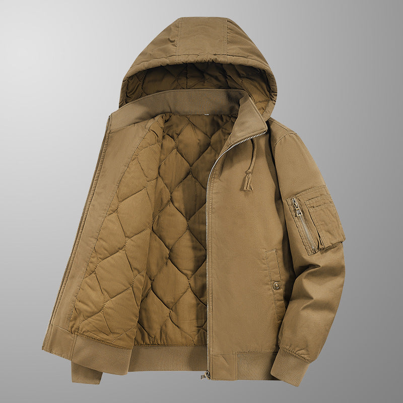 Brown quilted jacket with a hood on a gray background
