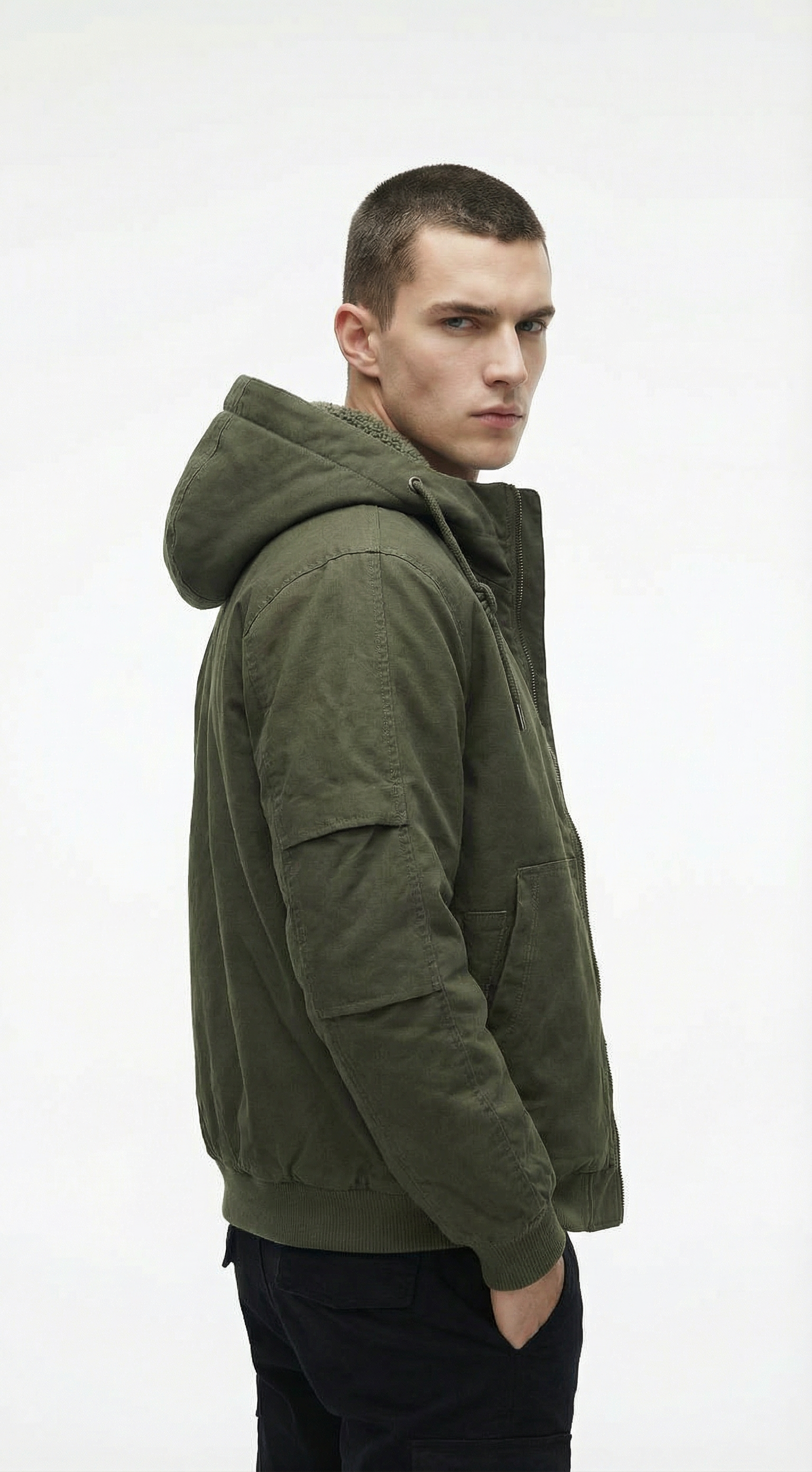 Man wearing a green hoodie from Meleche or Meléche (short as (Mé))