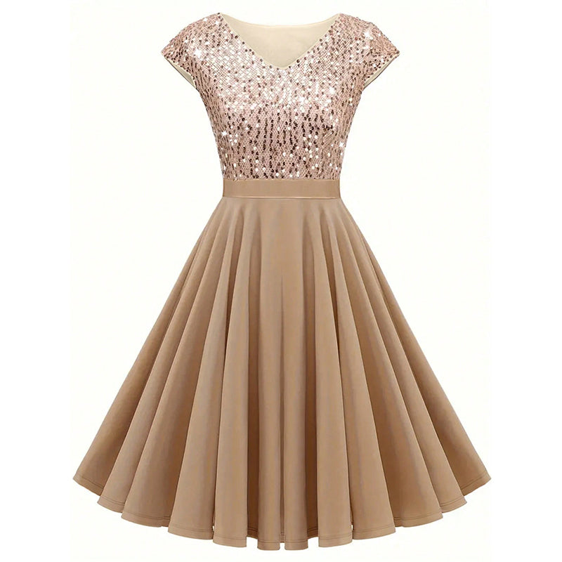 Beige dress with sequined top on a white background