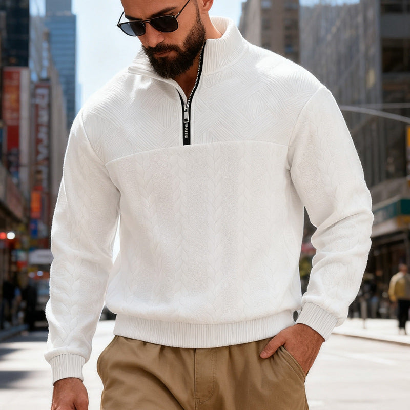 Man wearing a white sweater and sunglasses from Meleche or Meléche (short as (Mé)) on a city street