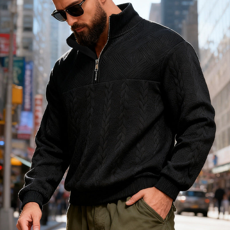 Man wearing a black pullover from Meleche or Meléche (short as (Mé)) with a cityscape background