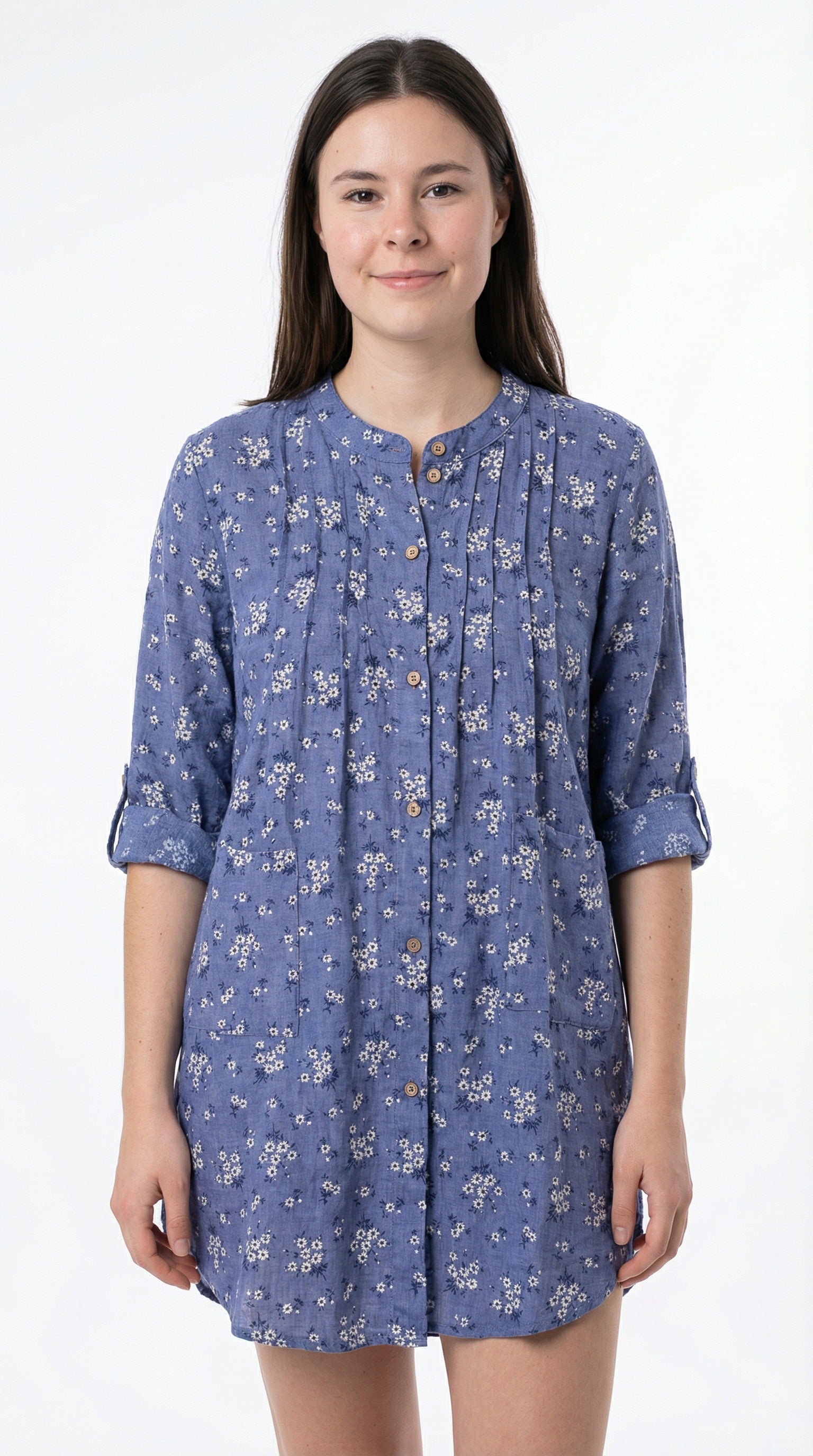 Blue floral dress on a wooden surface with decorative elements from Meleche or Meléche (short as (Mé))