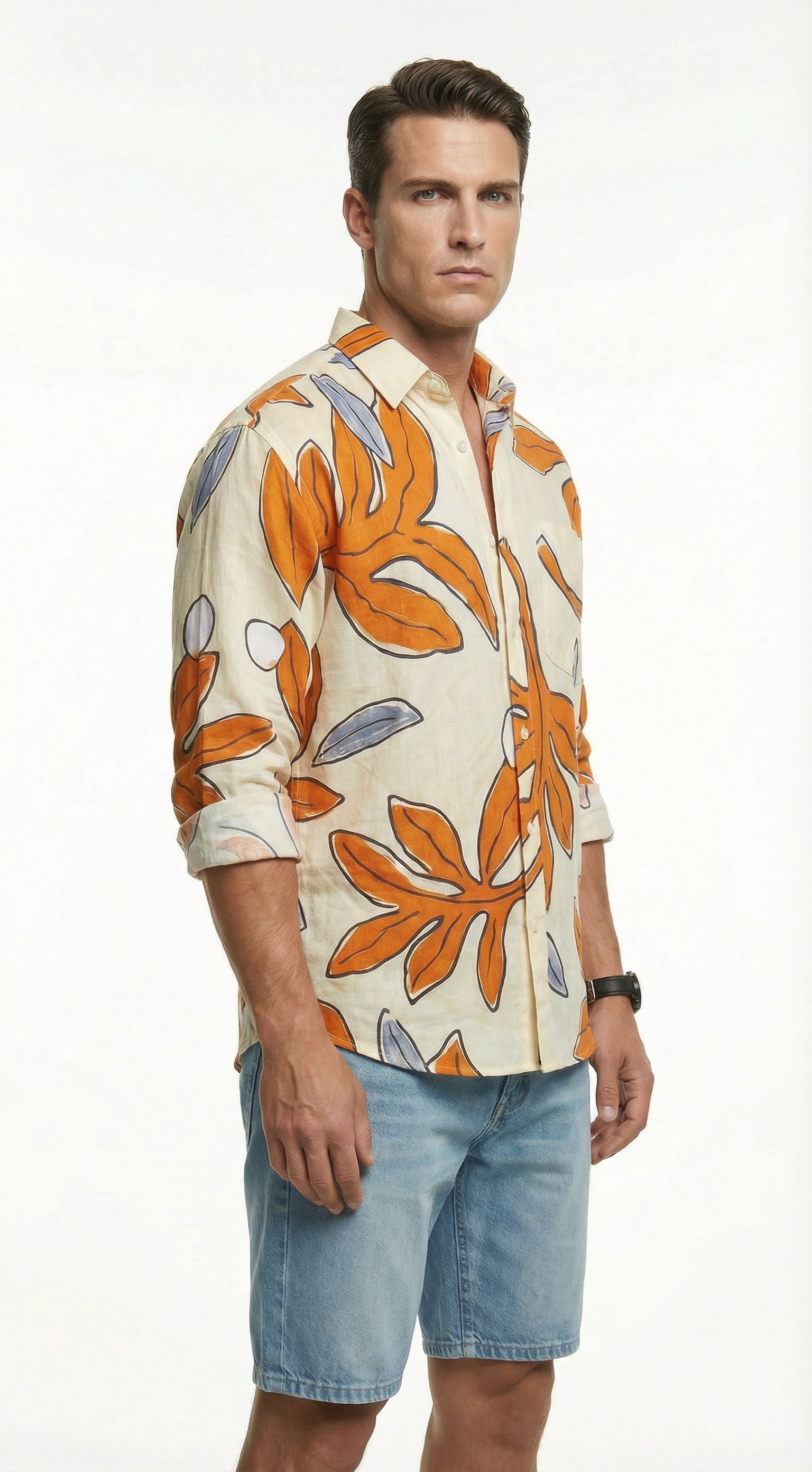 Man wearing a colorful floral shirt and denim shorts from Meleche or Meléche (short as (Mé))